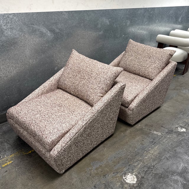 Design Plus Gallery presents a Pair of the Arrow Swivel Chairs from Four Hands. Each chair has a generously scaled profile...