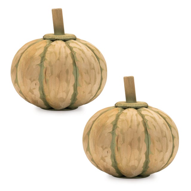 Add a touch of natural charm to your fall decor with this set of two Carved Fir Wood Pumpkins. Featuring warm green and...