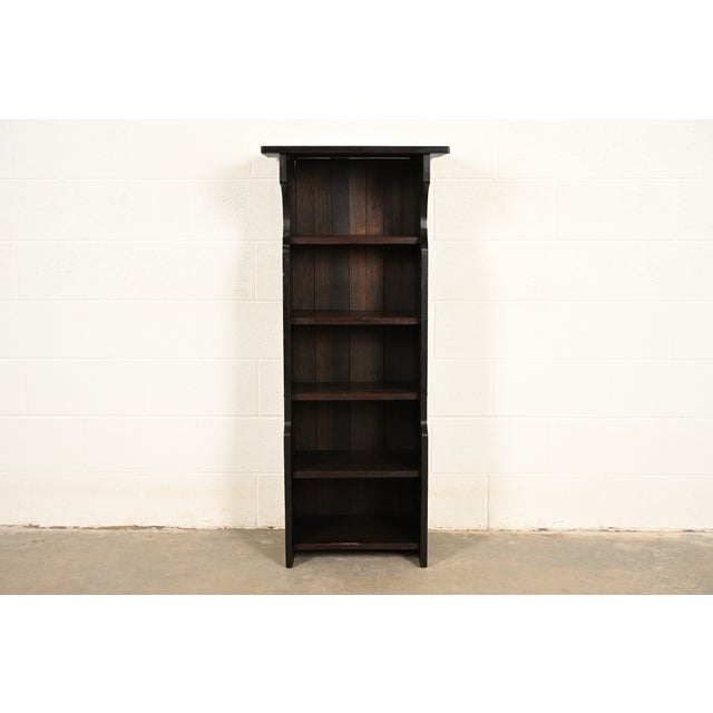 A gorgeous antique Mission or Arts & Crafts period oak bookcase or magazine stand In the manner of Stickley Brothers USA,...
