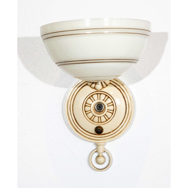 Pair of polychrome Deco sconces manufactured by the Markel lamp company of Buffalo. Ten pairs available. Newly rewired for...
