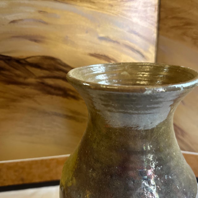 Up for consideration is a beautiful vintage hand made ceramic detailed brown pottery vase. This is such a simple but...