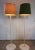 Two floor lamps maufacutred in sweden and luxus. They are made in white with an iron cast base. The uplight shades are in...