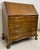 1940's secretary desk with drop leaf feature - plenty of organizational space Original finish and brass hardware H: 42" D:...