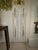 The product is a pair of large scale Murano glass leaf sconces, which are lighting fixtures designed in an elegant and...