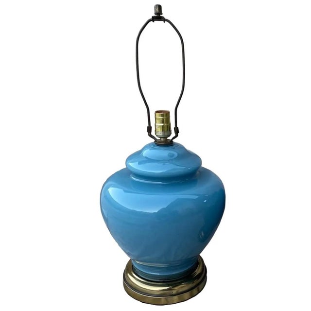 With a brass base, this striking cornflower ginger jar enclosed in glass has both a modern and chinoiserie vibe, based on...