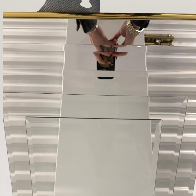 A monumental example of 1970s Op Art decor featuring a striking concentric square design that creates an architectural...