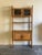 Danish shelving unit crafted in solid oak, featuring a light, warm grain and a timeless Mid-Century silhouette. This piece...