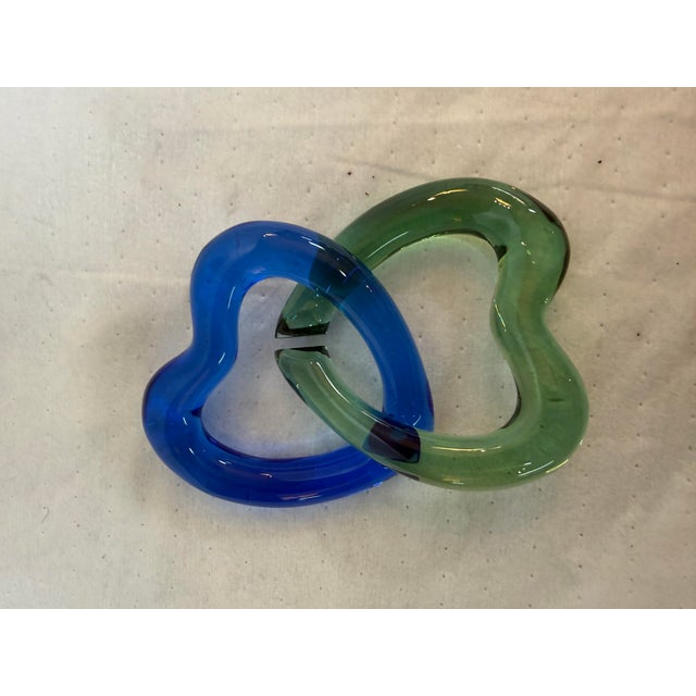 Design Plus Gallery presents a Pair of Linking Hearts + Original Box from Baccarat. This is a wonderful set to produce to...