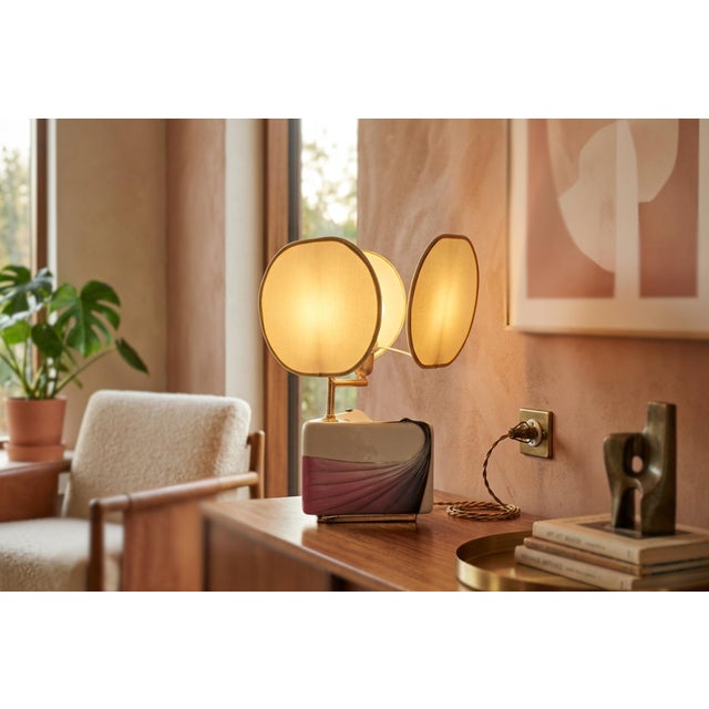 A unique design piece that combines the aesthetics typical of the era (Space Age/Modernist) with a sculptural form...