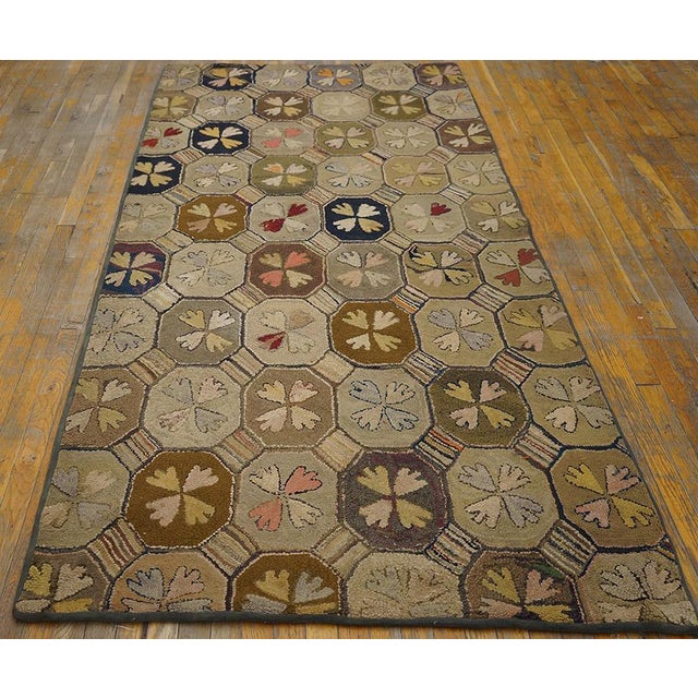 Antique American Hooked rug. Size: 4'2" x 8'10". American Hooked Rugs Contemporary American Hooked carpet utilizing strips...