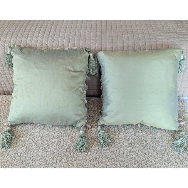 These stunning and elegant decorative throw pillows feature a soft sage green Silk fabric that gives off a subtle sheen....