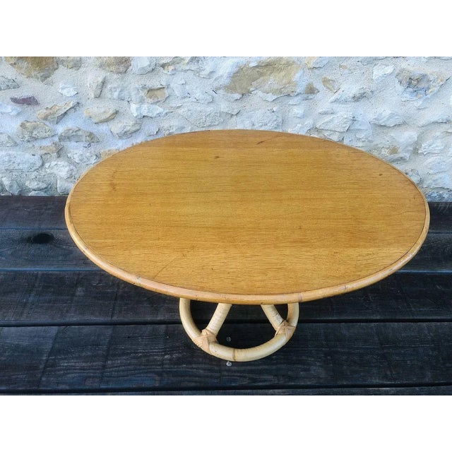 Mid-century, vintage side table circa 60’s. Top is made of clear wood with a varnish finish. Edging and piédestal base are...