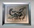 The frame surrounding the print is a particularly original and unusual piece. It was recently crafted by an elderly master...