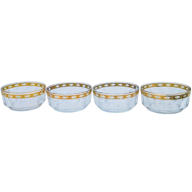 Gorgeous set of four midcentury 22-karat gold glass bowls with an ornate green and golden design. Marked: Arcoroc France....
