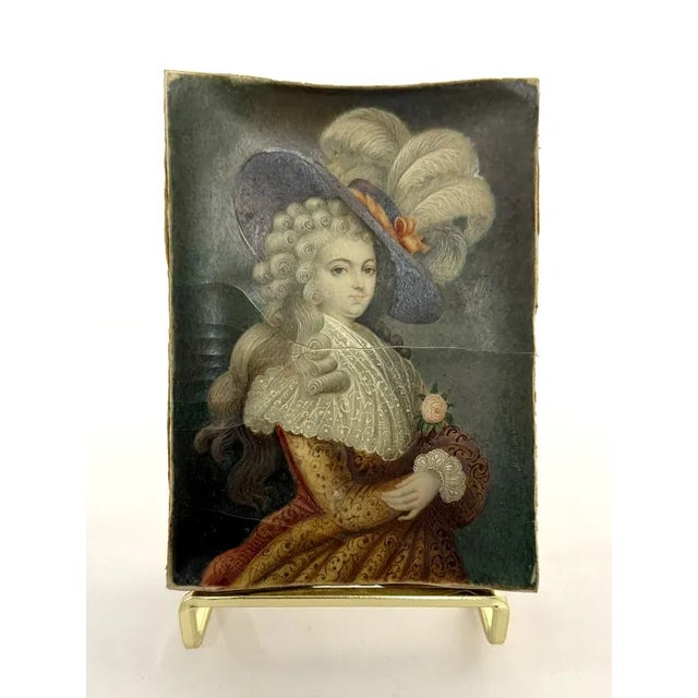 Antique hand painted miniature, finely detailed 18th-century portrait depicting an elegant lady with curled hair, wearing...