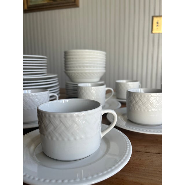 Rare in large quantities!! This 44 piece Farberware Trellis (pattern #4562) dinnerware set is in excellent used condition....