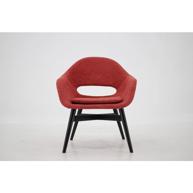 Newly upholstered - The wooden parts have been refurbished and stained in mat black color. This piece is attributed to the...