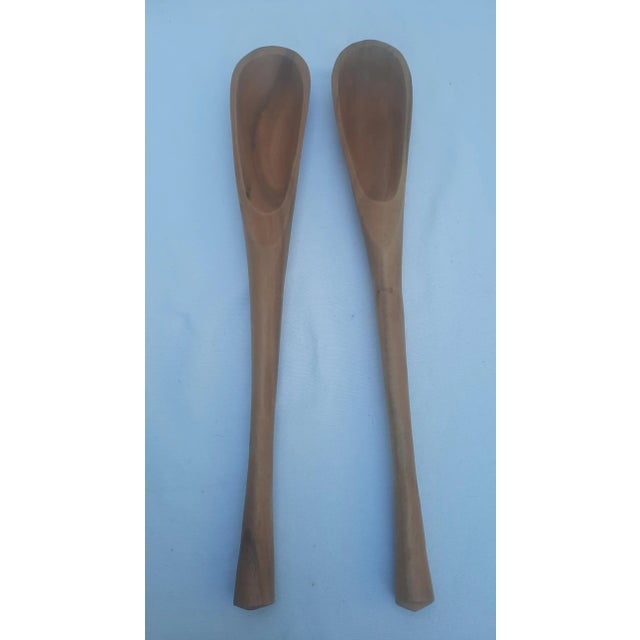 This is an unused original set of the so-called "Wood Classics" Dansk salad spoon utensils stamped JHQ (Jens Harald...
