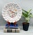 A vintage hand-painted Portuguese ceramic bowl featuring a colorful bird of paradise among flowering branches. Marked...