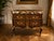 Bring timeless French elegance into your home with this Louis XV–style commode, beautifully crafted with a rich dark wood...