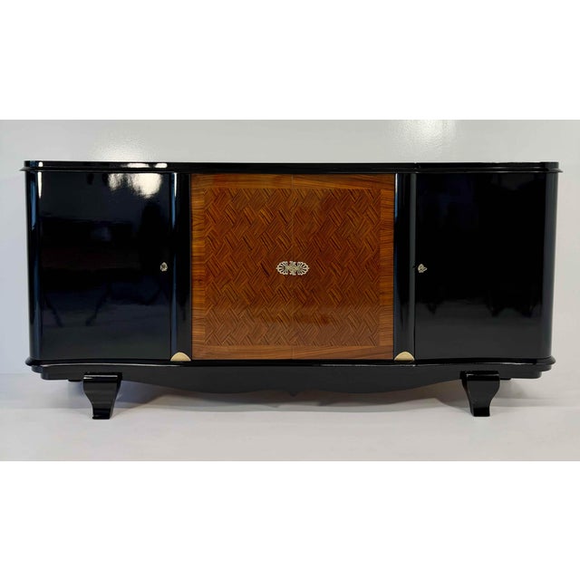 French Art Deco Black Lacquered and Inlaid Walnut Sideboard in the style of Jules Leleu, 1940s, in Restored conditions....