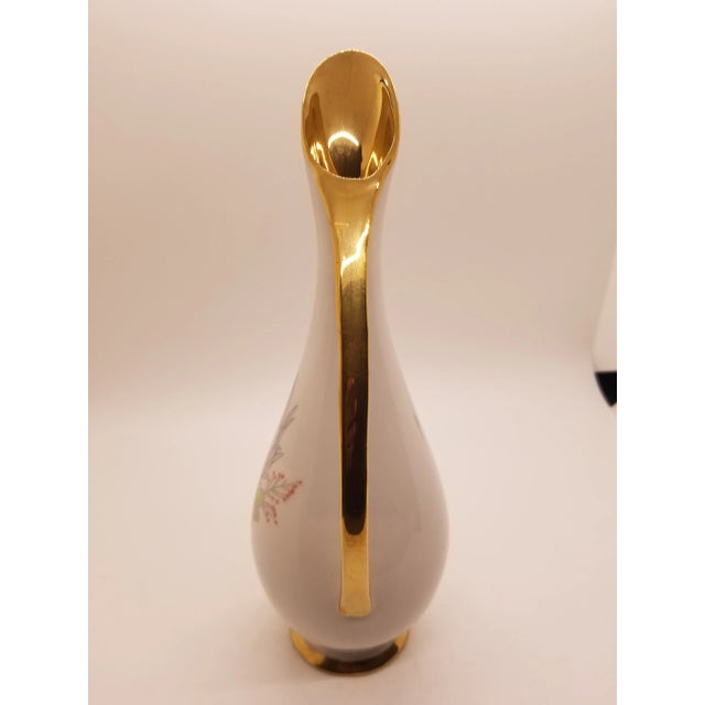 Elegant Gold painted handle Vase made in West Germany by Foreicer made in 1950 with florals.