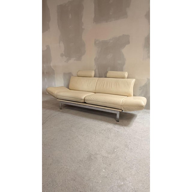 De Sede DS-140 sofa from the 1980s, designed by Reto Frigg. Upholstered in high-quality beige leather, this sofa features...