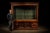 Monumental solid wood mercantile display cabinet featuring a full-width counter-balanced lift-front glass door, a design...