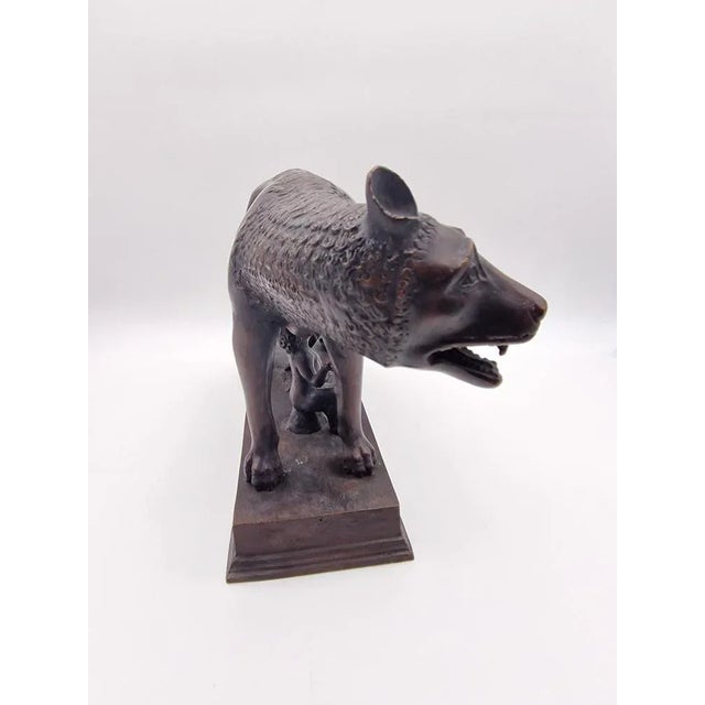 Roman she-wolf - bronze sculpture in pattina. Roman She-wolf - depicts the symbol of Rome with Romulus and Remus being...