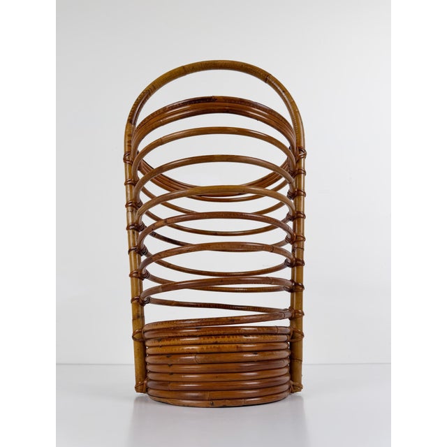 We are pleased to offer for sale an elegant Mid-Century Modern rattan umbrella stand, attributed to the celebrated Italian...