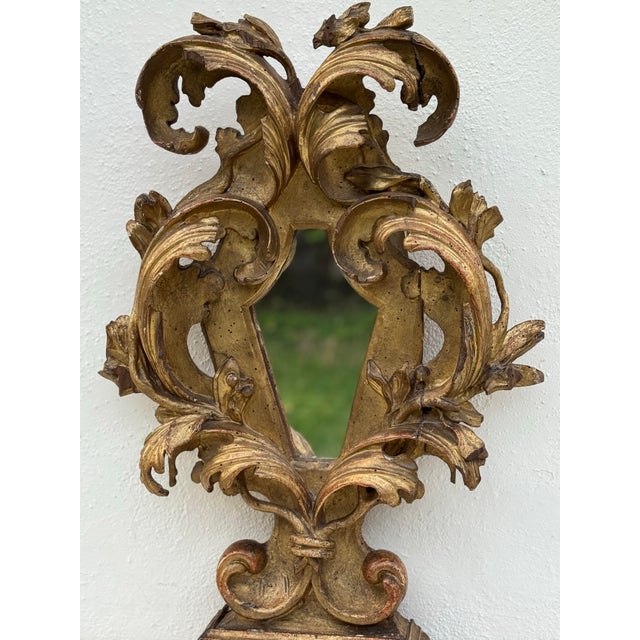 gorgeous exhuberant antique reliquary- carved and gilded with no restoration. late 17th century italian. see photos for...