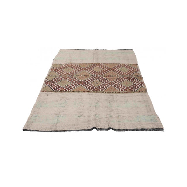 Handwoven vintage embroidered kilim rug from Marash region of Turkey. Approximately 50-60 years old. In good condition....