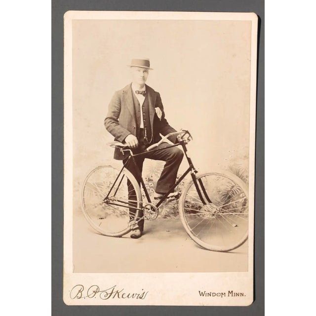 Circa 1890-1910 CDV of a man and his bike taken in Windsor, Minnesota.