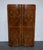 A striking circa 1930s English Art Deco wardrobe, crafted in beautiful burr walnut with dramatic swirling grain patterns...