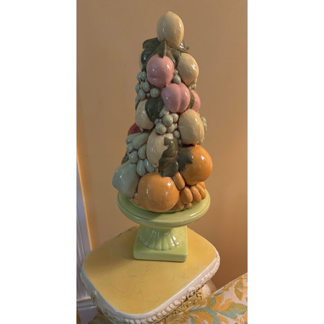Gorgeous vintage Italian hand painted fruit topiary on a pedestal base. It’s done in various watercolor shades of greens,...