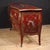 French commode from the second half of the 20th century. A curved furniture, richly lacquered, gilded, and hand-painted...