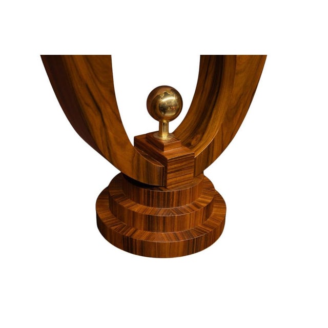 A pair of unique mid-20th century table lamps. Impressive mid-20th century table lamps. Made of walnut wood with metal...