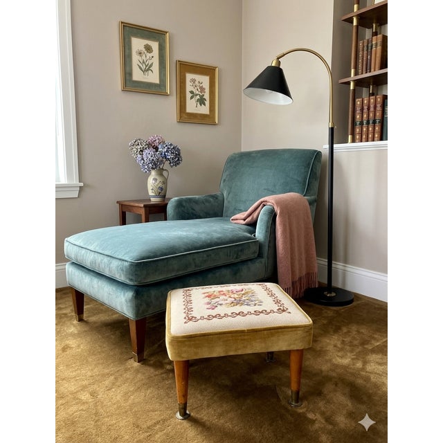 Elevate your space with this captivating mid-century modern square footstool, a delightful marriage of clean-lined atomic...