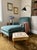 Elevate your space with this captivating mid-century modern square footstool, a delightful marriage of clean-lined atomic...