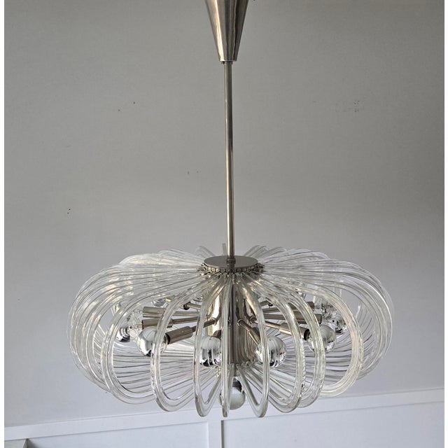 Rare 1960 Mid-Century Modern 12-light crystal loop chandelier by prestigious Austrian maker E. Bakalowits Söhne. Designed...