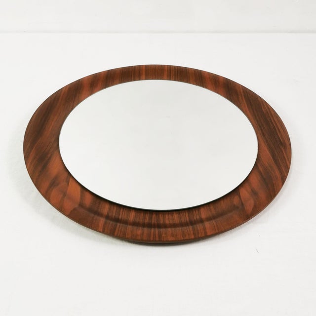 Wall mirror, Denmark, 1960s. It features a simple, minimalist design. Made of teak wood and glass. Condition: good to very...
