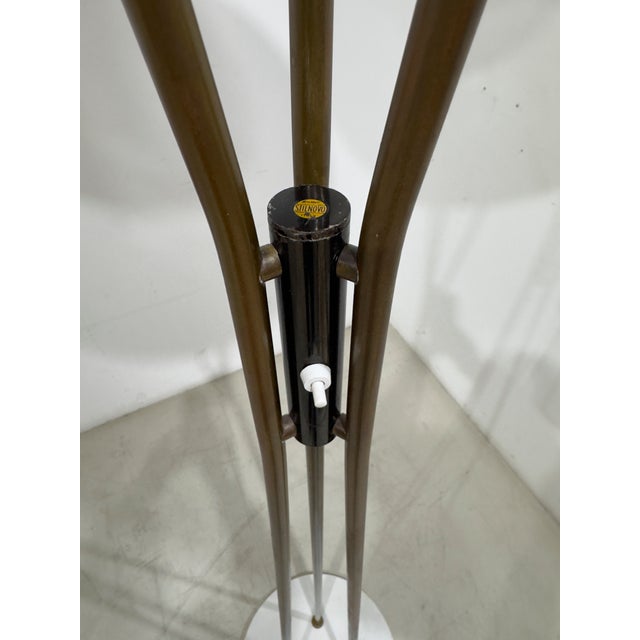 Floor lamp, brass frame and curved glass diffuser. Marble base. Original trademark: Gaetano Sciolari. Produced by...