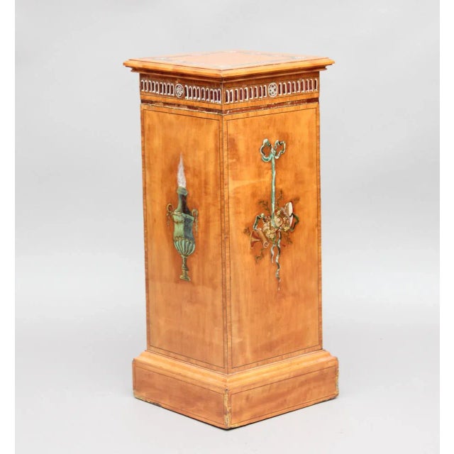 A nice, decorative early 20th-century satinwood painted pedestal in the style of Sheraton. It was designed circa 1910.