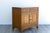 1970's Asian style cabinet of double doors and single drawer This cabinet has minor wear and light scratches consistent...