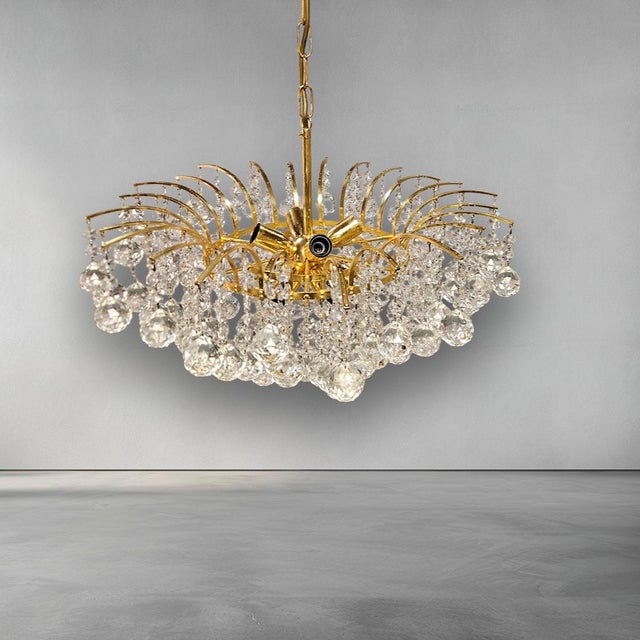 Mid-Century Crystal and Brass Chandelier attributed to Palwa, Germany, 1960s, in Very Good conditions. Designed 1960 to...