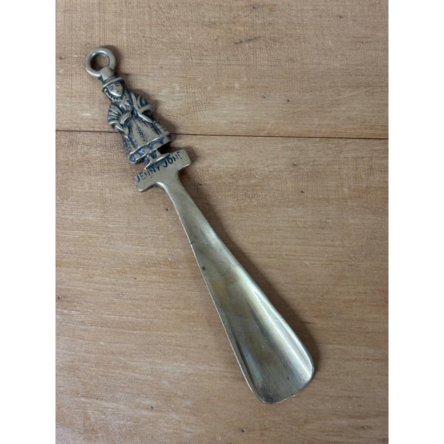 This unique vintage brass shoe horn from Wales is a beautifully crafted tribute to Jenny Jones, a beloved figure in Welsh...