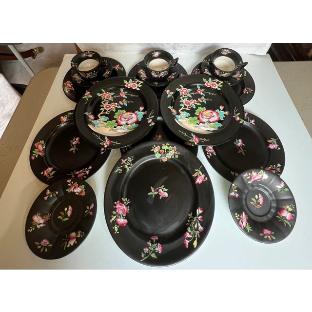 Maon's ironstone in black with chinoiserie styel floral motifs. There are 2 Black Chinese Plates measuring 9.75" One...