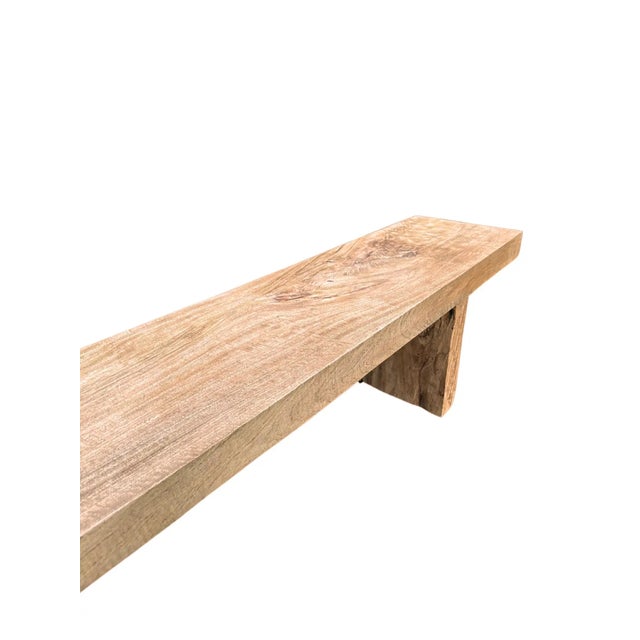 A sculptural hand-carved mango wood bench, a wonderful addition to bring warmth any space. The table is hand-carved by...