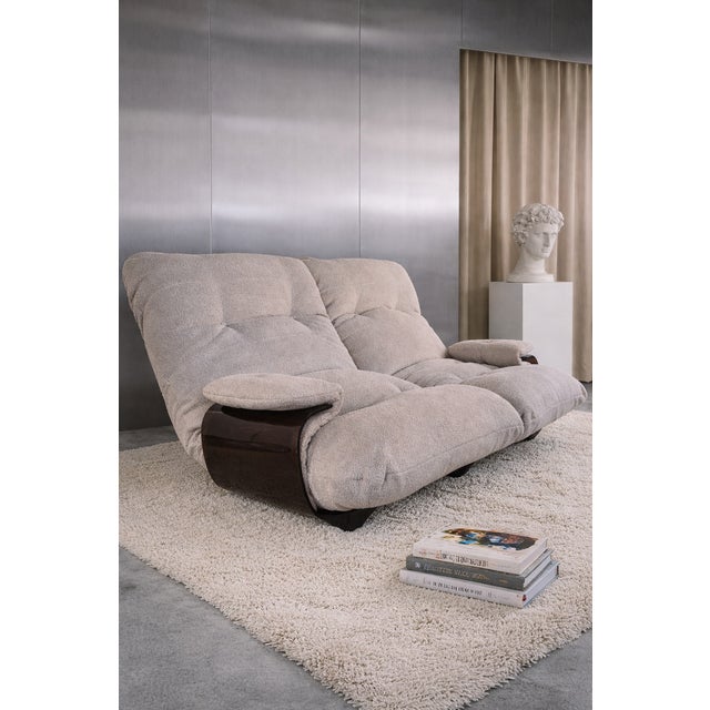 Marsala 2-seater sofa by Michel Ducaroy (designer of Togo), for Ligne Roset. Reupholstered in bouclé fabric. Thermoformed...