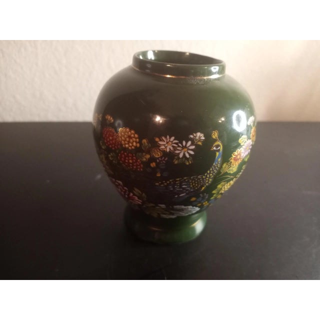 This is a Japanese Emerald Green Moriage Round Bud Vase. Procured at an auction.